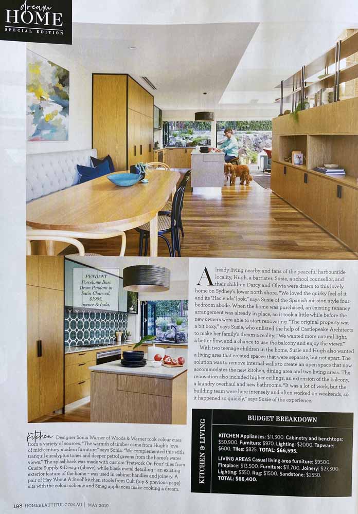 Image of Australian Home Beautiful Magazine article that discusses home interior design and renovations. This particular image features timber kitchen cabinetry, table, chairs and a painting on the wall.