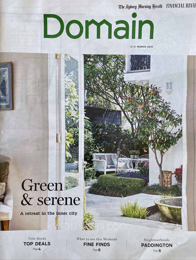 Image of The Sydney Morning Herald, Domain Magazine Cover featuring doors opening to a backyard with articles and images of homes and houses for sale.